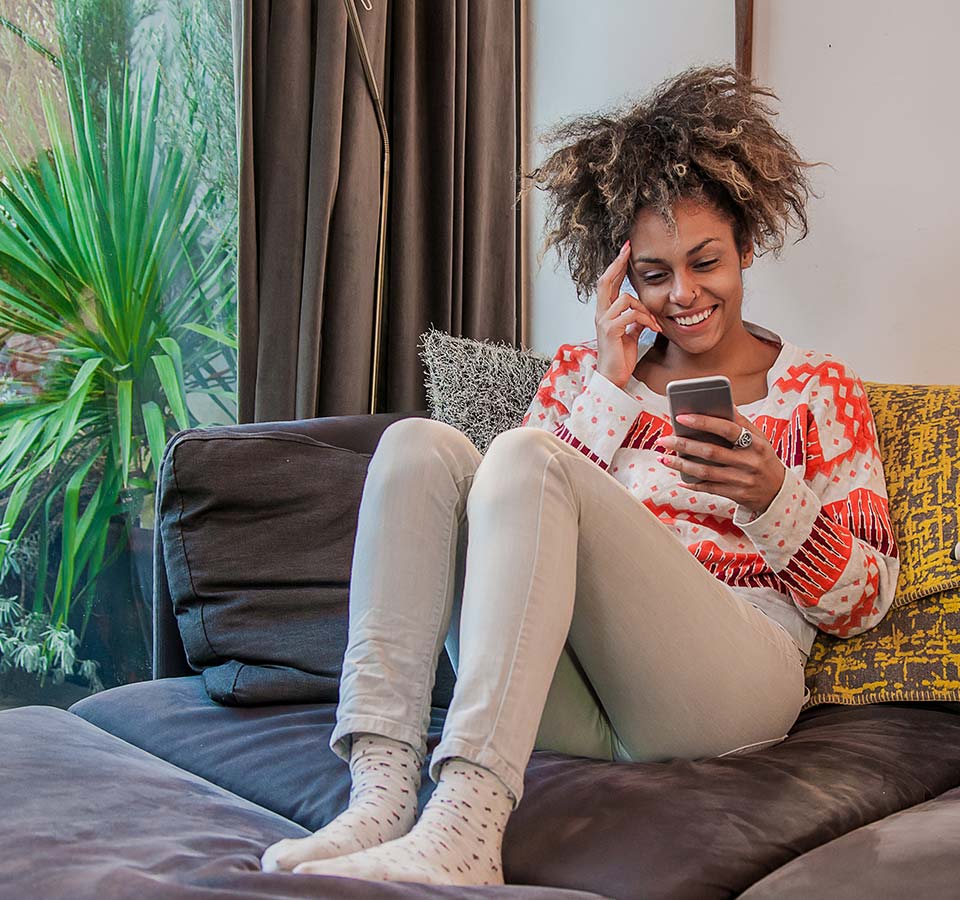 Photo of a woman on her mobile phone
