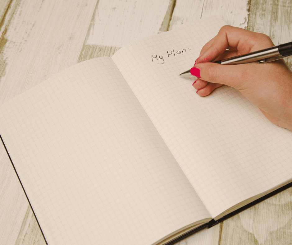 Woman writing in a notebook